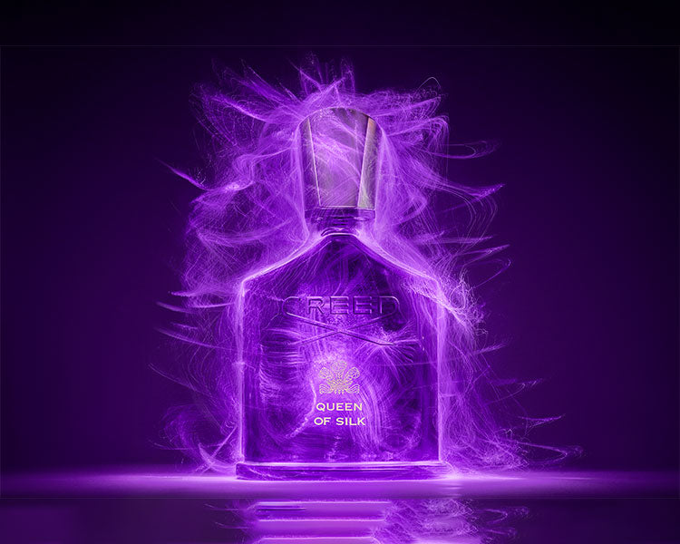 Queen of Silk with purple fog around the bottle