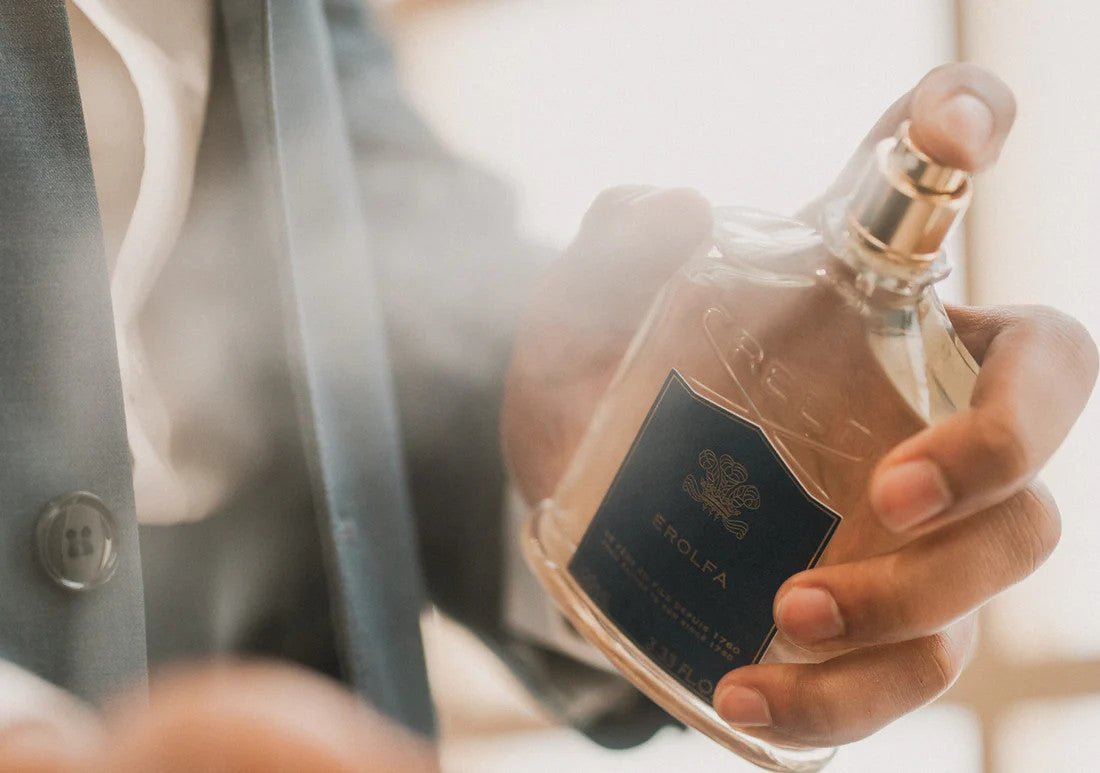 A man is spraying Bois du Portugal EDP 100ml 