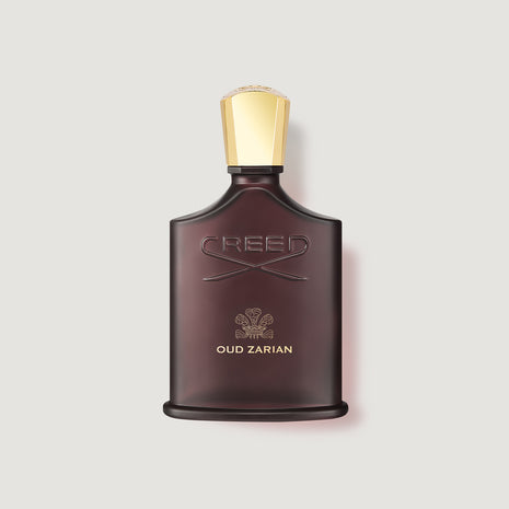 Creed Oud Zarian perfume bottle on a light gray background