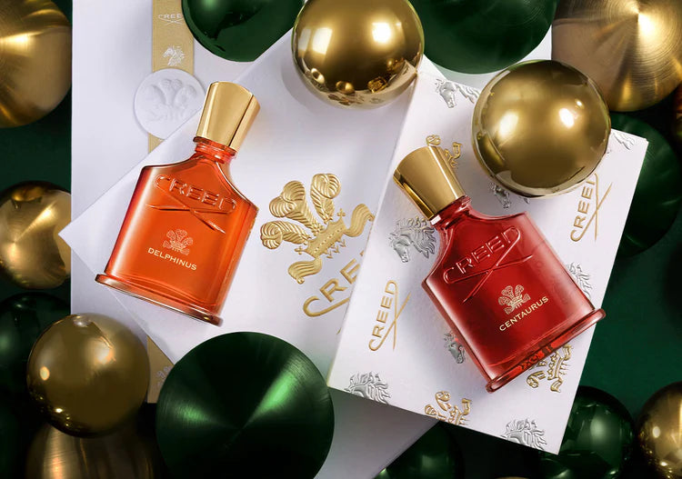 The Amber Duo bottles on top of Creed gift box.